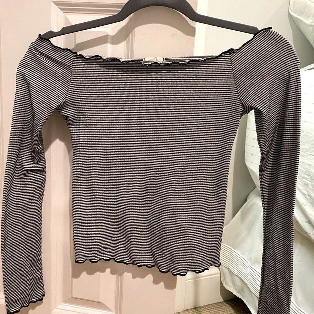 Adorable Woman’s Off-The-Shoulder Blouse